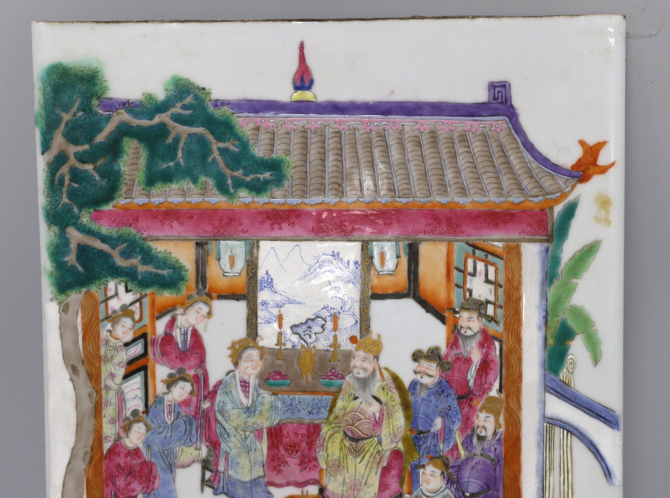 A Chinese famille rose plaque, painted with a court scene, 42.5 x 27cm